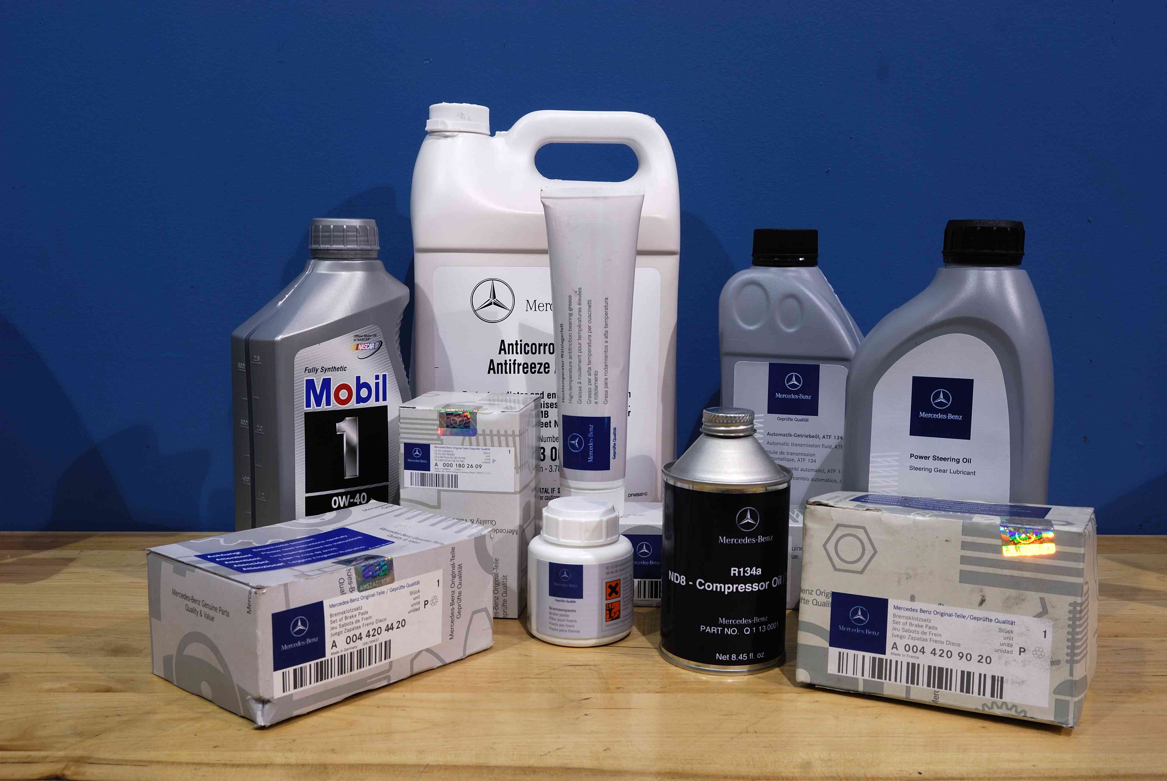Mercedes-Benz approved fluids and service parts on a workbench